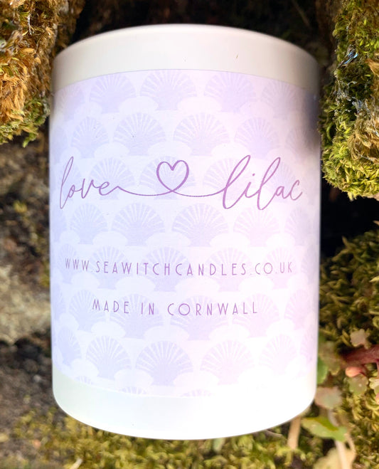 Love Lilac Candle  £22  Beautiful Lilac Scented Candle  Burn time of at least 50 hours  &nbsp; Ingredients: natural vegan plant wax, fragrance oils, cotton wick  &nbsp;This candle is hand poured into a white china pot and is made in Mousehole, Cornwall by Seawitch Candles&nbsp;  " This candle reminds me of childhood. We used to play in a field which was full of lilac trees in the Spring - it takes me right back , how they capture that exact smell is truly amazing" Anastasia Wood