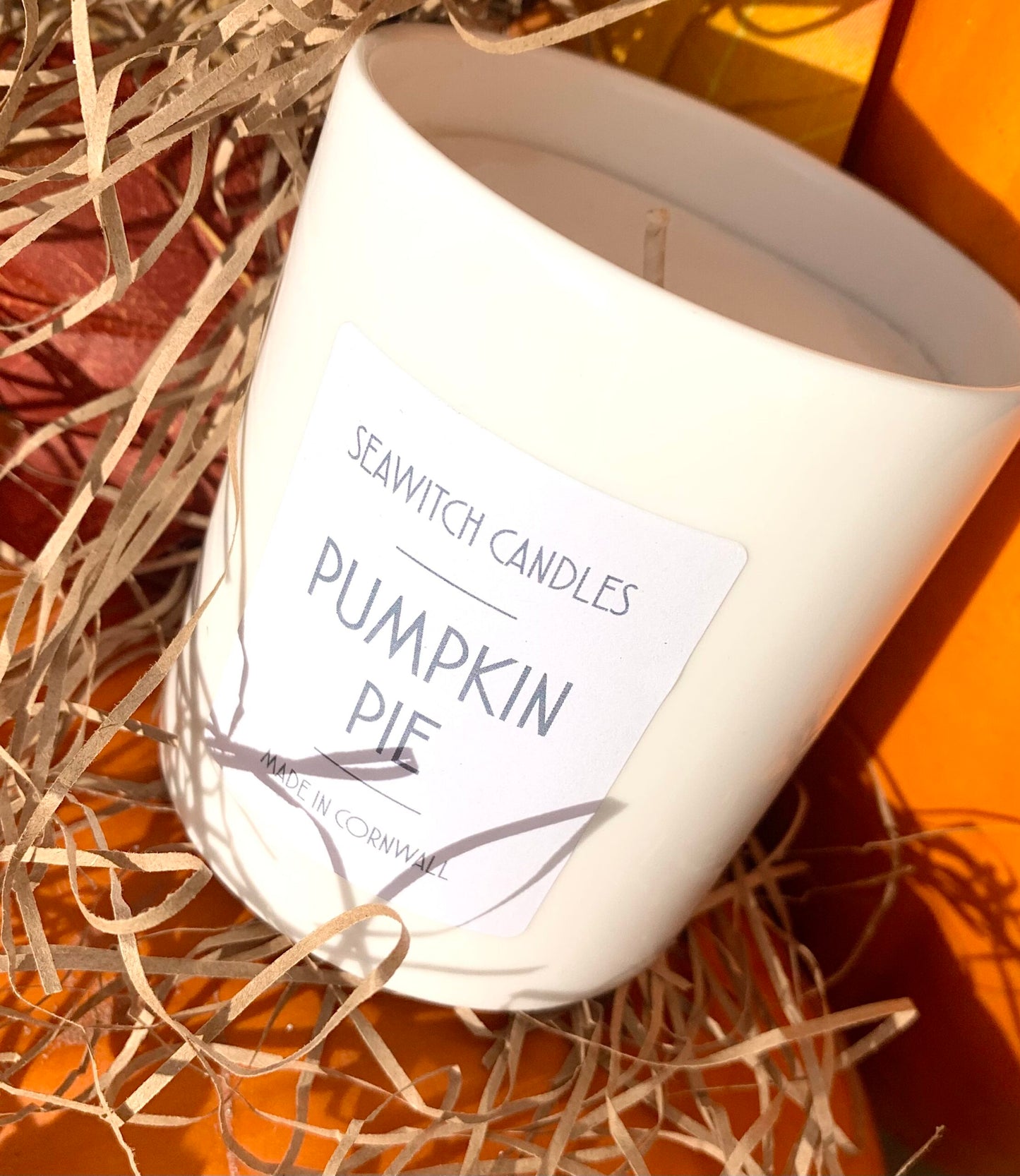 Pumpkin Pie Scented Candle&nbsp;  £20  Caramelised citrus blended with nutmeg, ginger and &nbsp;clove wrapped in a blanket of vanilla  &nbsp;Burn time of at least 50 hours  Ingredients: natural vegan plant wax, fragrance oils, cotton wick  This candle is hand poured into a white china pot and is made in Mousehole, Cornwall by Seawitch Candles Halloween, Pumpkins, Samhain
