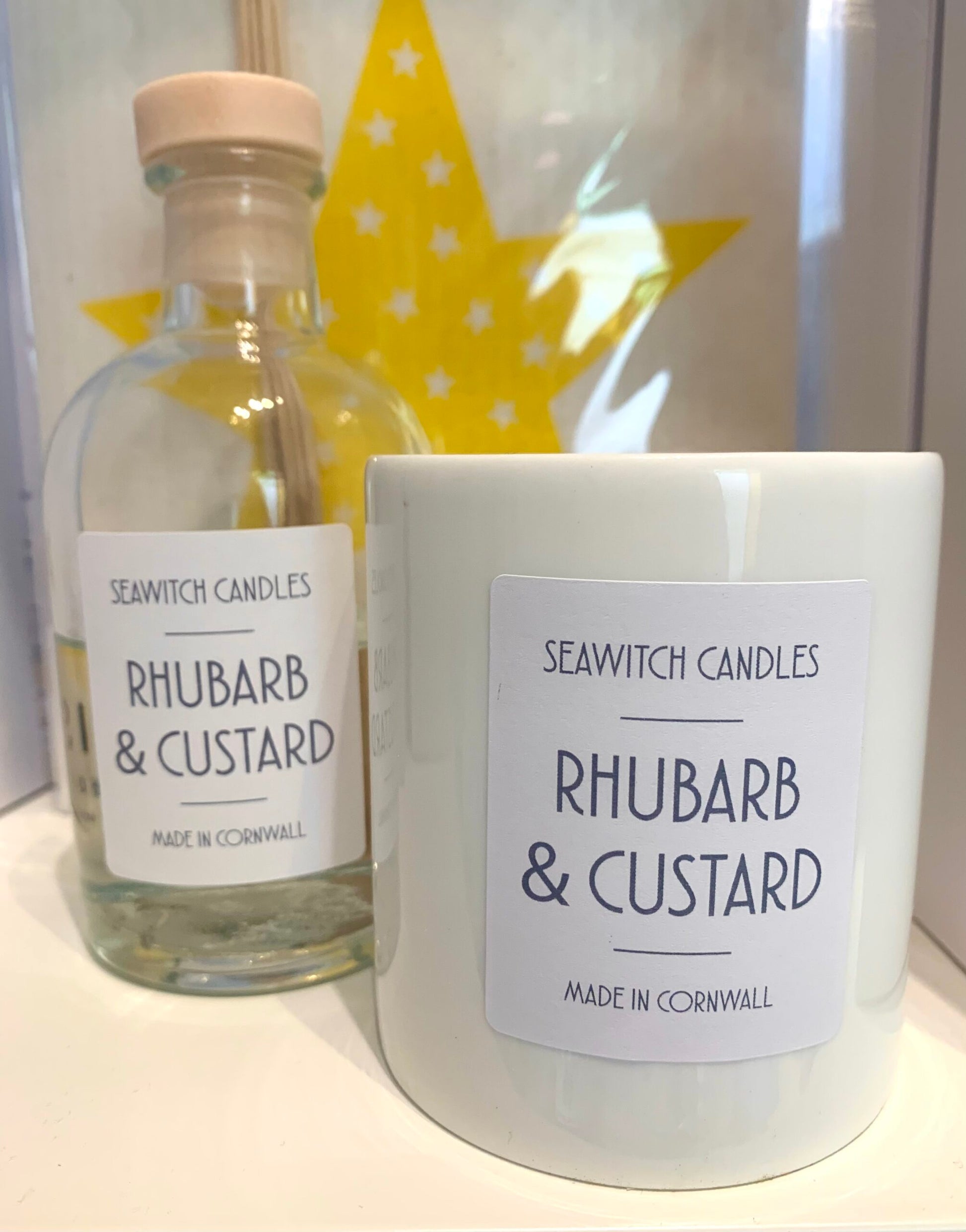 Rhubarb &amp; Custard Scented Candle&nbsp;  £20  The perfect duo: tart pink rhubarb and creamy vanilla custard  &nbsp;Burn time of at least 50 hours  Ingredients: natural vegan plant wax, fragrance oils, cotton wick  This candle is hand poured into a white china pot and is made in Mousehole, Cornwall by Seawitch Candles