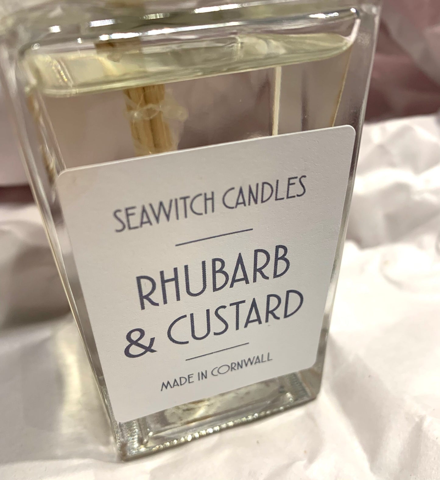 Rhubarb and Custard Scented Reed Diffuser  £22  The &nbsp;perfect duo : tart pink rhubarb and creamy vanilla custard    This 100 ml diffuser releases a constant aroma to scent your room beautifully for at least 12 months  Made in Mousehole, Cornwall by Seawitch Candles Ingredients: Base oil and fragrance oils – comes with 6 natural reeds
